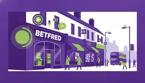 Betfred branded betting shop exterior on a British high street, daytime