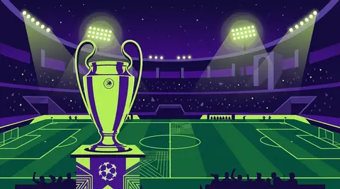 UEFA Champions League trophy on a stadium pitch under floodlights at night